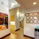 Hallway with art and certifications