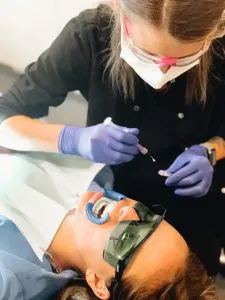 Patient getting teeth whitening