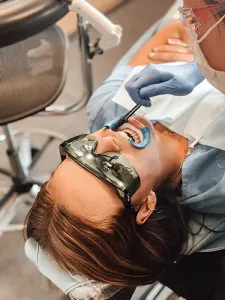 Patient getting teeth whitening