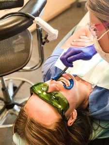 Patient getting teeth whitening