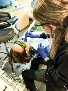 Patient getting teeth whitening